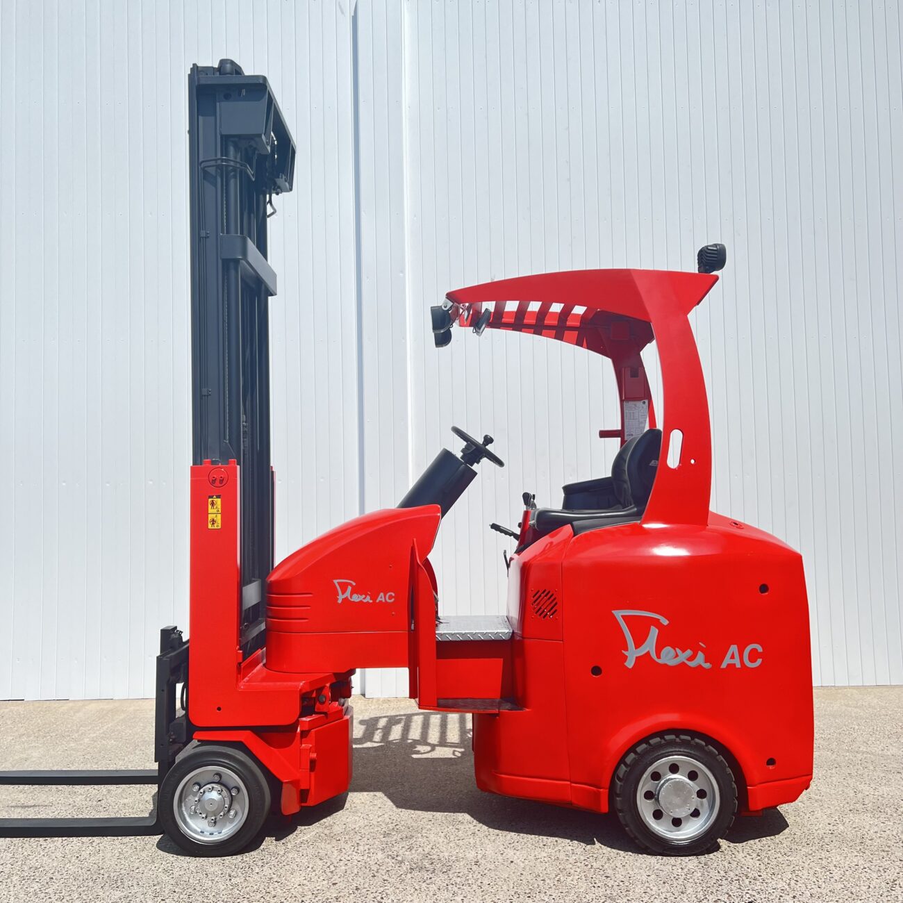 Side view of red FLEXI AC1200 USED ARTICULATED FORKLIFT (#4659)